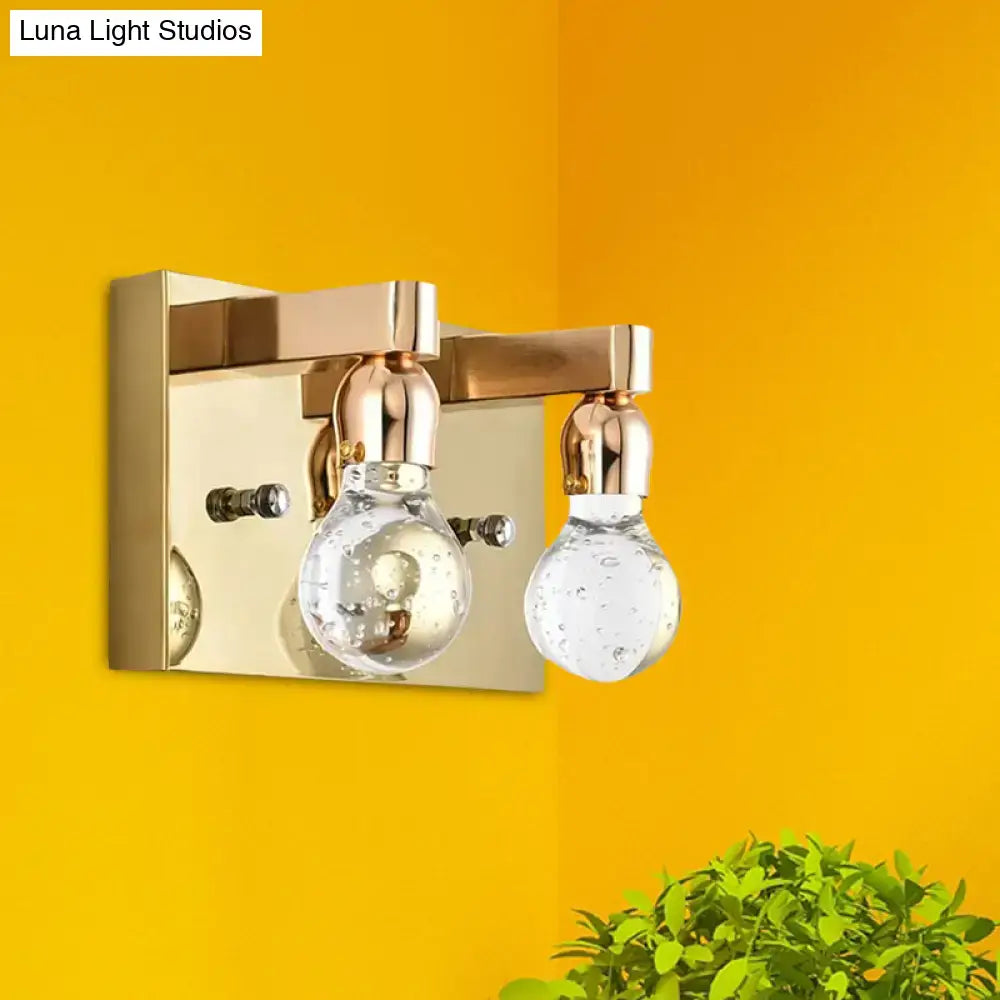 Modern gold bulb shaped crystal wall sconce with brass finish and bubble detail glass globes for 110v-120v bedroom lighting