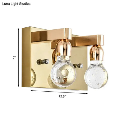 Modern gold bulb shaped crystal wall sconce with clear glass bubble bulbs and polished brass for 110v-120v bedrooms