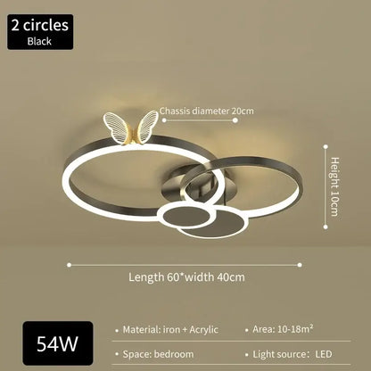 Black modern ceiling light with two interlocking rings and gold butterfly accent made of iron and acrylic decorbites butterflies ceiling light