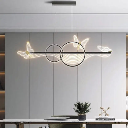 Modern black metal pendant light with glowing white butterfly and circular led accents decorbites butterfly chandelier