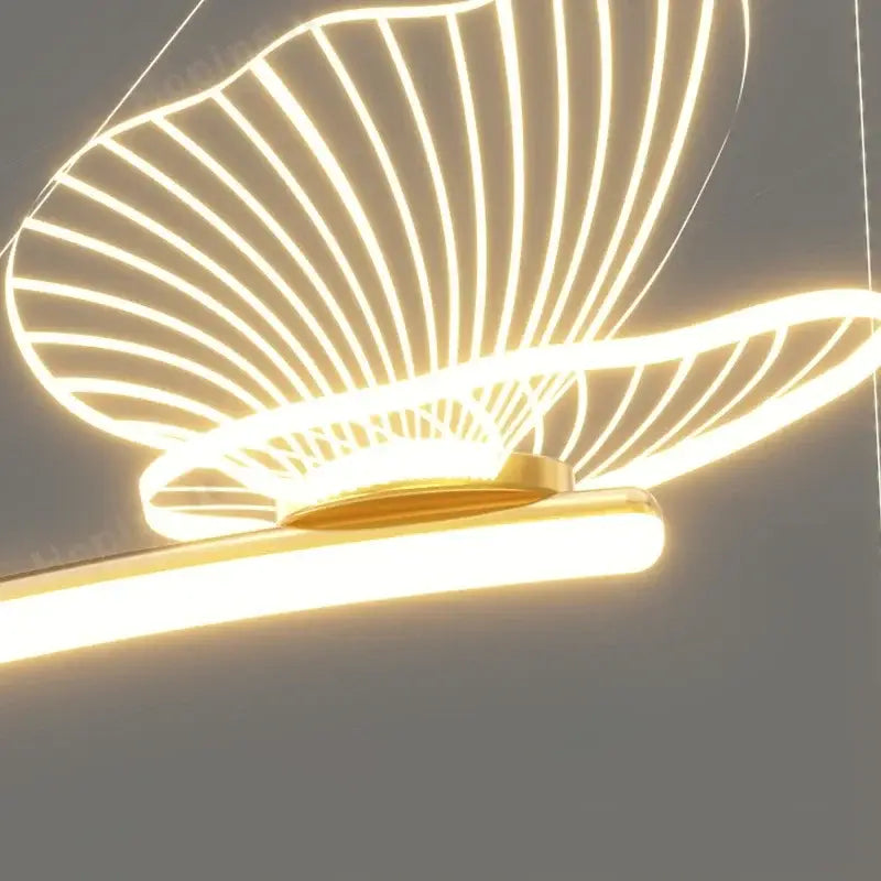 Modern gold butterfly design sense ceiling chandelier with glowing white neon wings and sleek horizontal bar base