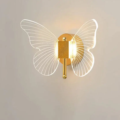 Modern gold butterfly nordic led wall lamp with translucent wireframe wings and glowing central light for decorbites wall lamp