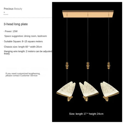 Modern gold butterfly pendant lamps featuring gold-toned three-head pendant lights with textured triangular glass shades