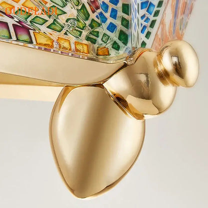 Modern gold butterfly wall lamp with gold-toned metallic turtle base and colorful mosaic glass top for decorbites butterfly wall decorbites butterfly wall lamp