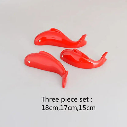 Set of three glossy red ceramic dolphin figurines with silver dots complement decorbites carp fish wall pendant decor