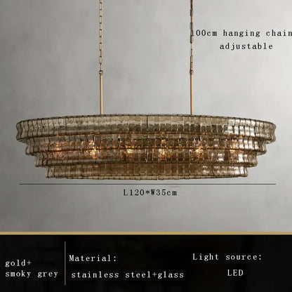 Modern gold cascading crystal pendant lights featuring tiered brown glass pendant panels and gold stainless steel chains