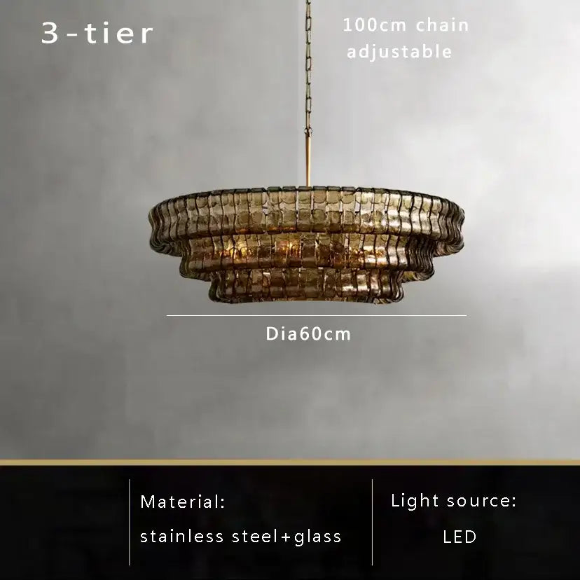Modern gold cascading crystal pendant lights featuring a three-tiered brown glass pendant with stainless steel frame and adjustable chain