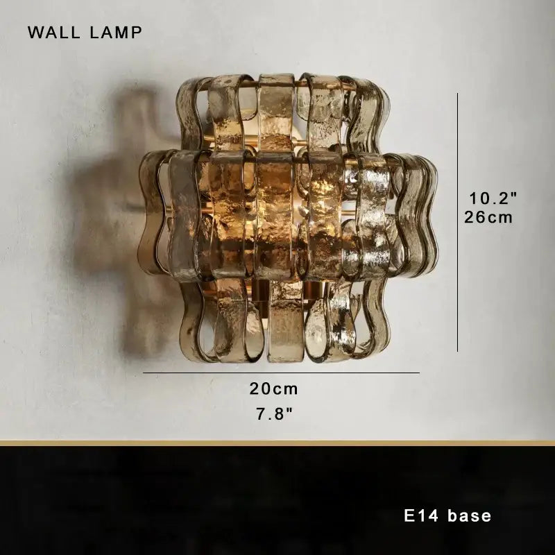 Modern gold cascading crystal pendant lights featuring a textured amber brown glass pendant for elegant dining room decorbites brown glass