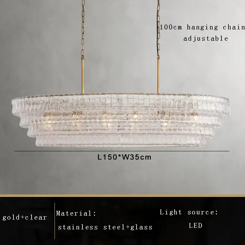 A modern gold cascading crystal pendant light with clear glass tiers and gold stainless steel accents for dining room decorbites brown glass pendant