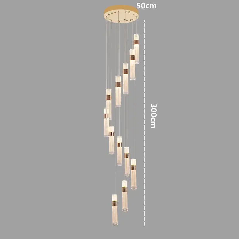 A modern design pendant light with adjustable height featuring gold-toned mount and translucent glass cylinders for dining room