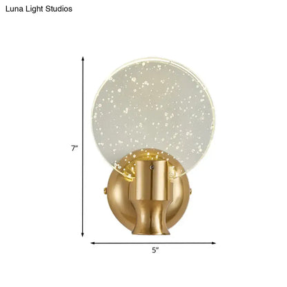 Modern gold circle panel wall light with direct wired electric installation and bubble crystal translucent glass shade