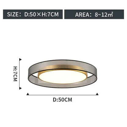 Modern gold circular led ceiling light with a sleek silver and gold metallic frame and white diffuser decorbites circular led