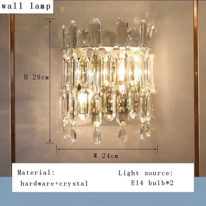 Modern gold clear crystal oval chandelier with sleek metallic frame and cascading clear crystal prisms for dining room decorbites clear crystal