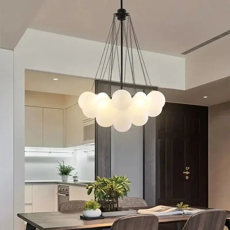 Modern gold cloud glass ball led chandelier with frosted glass globes and black metal frame for dining room decorbites glass ball