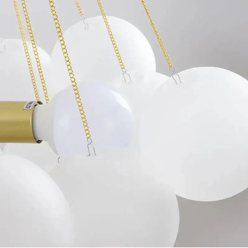 Modern gold cloud glass ball led chandelier with white spherical glass ball led pendants suspended by gold-toned chains