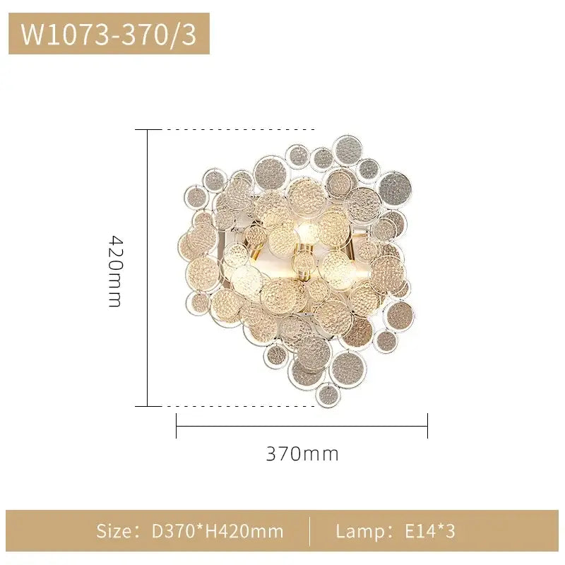 Modern gold cloud led ceiling chandelier with gold-toned wall sconce featuring textured circular glass discs