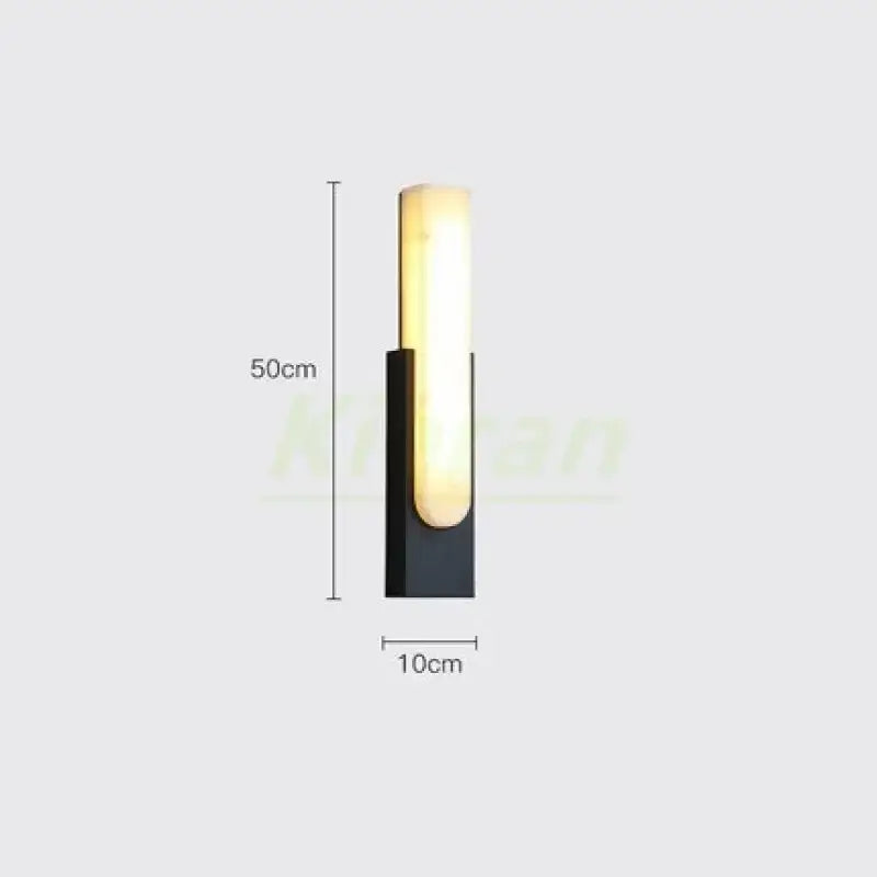 Modern gold decorbites cloud stone led wall light with sleek black base and warm translucent diffuser for bedroom decor