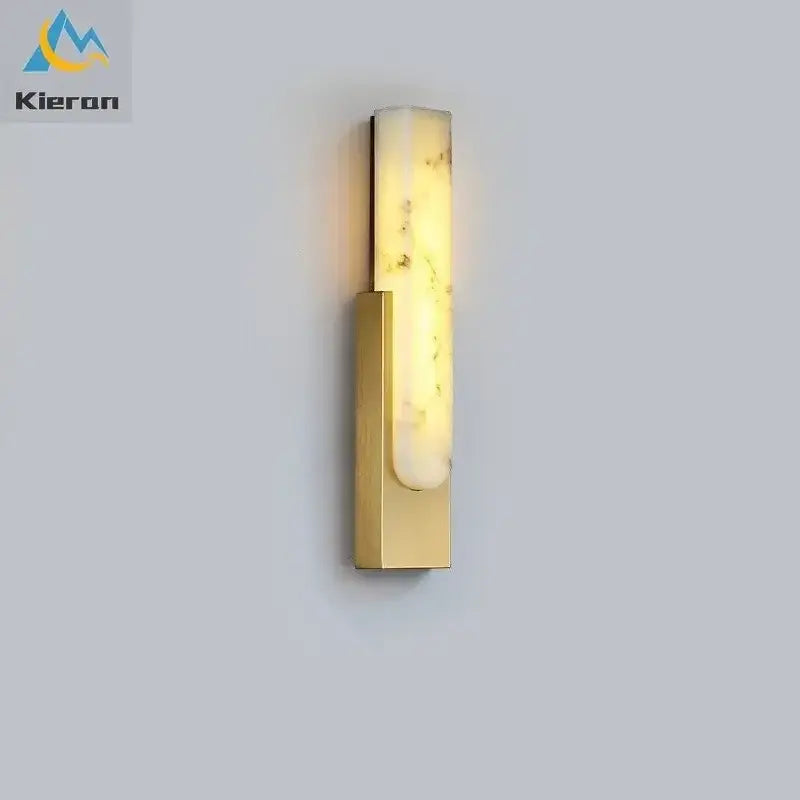 Modern gold cloud stone led wall light with rectangular white marble accent emitting warm light for bedroom decorbites wall light