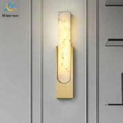 Modern gold cloud stone led wall light featuring a rectangular translucent marble-like panel emitting warm light for decorbites cloud stone decor