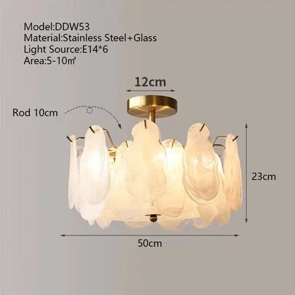 A modern gold cloudy glass chandelier with translucent shell-like glass shades on brass-finished steel frame by decorbites cloudy glass