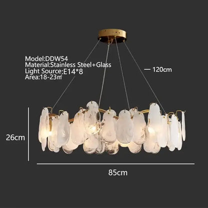 A modern gold cloudy glass chandelier with brushed brass frame and frosted glass discs for living room lighting decorbites cloudy glass