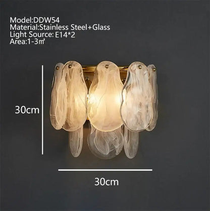 A warm modern gold cloudy glass chandelier with translucent leaf-like shades on brushed stainless steel frame for living room decorbites cloudy glass lighting