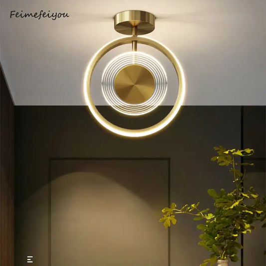 Modern gold concentric led ceiling light with a brushed metal disc by decorbites led ceiling for living room decor