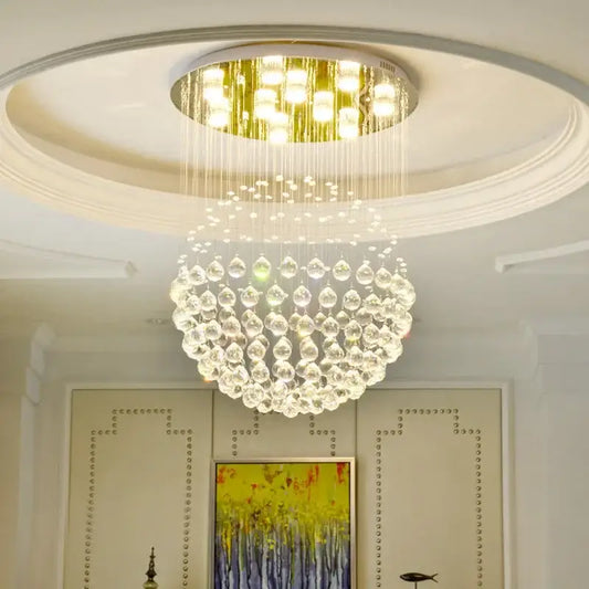 Modern gold crystal ball led chandelier with circular gold fixture and cascading clear teardrop crystals for dining room decorbites crystal ball led