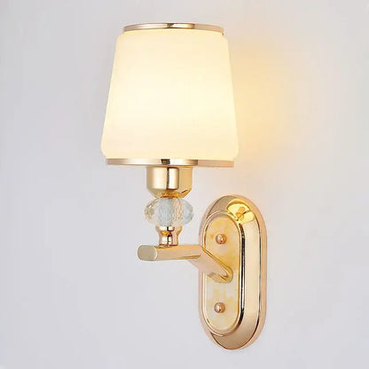 Modern gold crystal bedside wall sconce with frosted glass shade and ornate crystal accent for bedroom decorbites crystal bedside