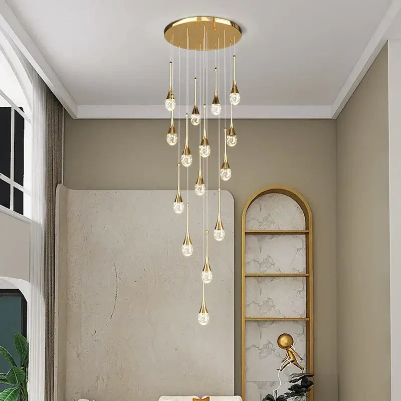 Modern gold crystal bubble chandelier with multiple teardrop-shaped pendants for dining room decorbites crystal bubble