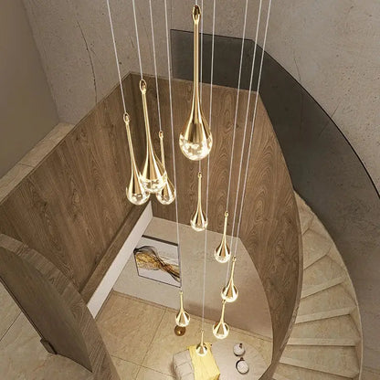 Modern gold crystal bubble chandelier with teardrop pendant fixtures by decorbites for dining room decor