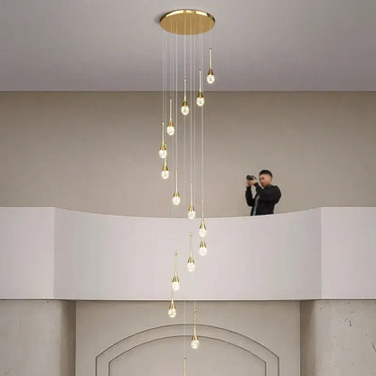 Gold-toned decorbites crystal bubble chandelier with multiple teardrop pendants for modern dining room decor