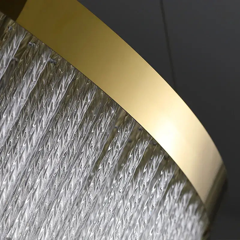 Modern gold crystal ceiling chandelier pendant light with a circular frame and cascading clear textured glass rods for dining room decorbites crystal ceiling