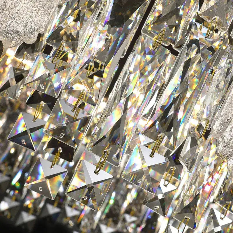Modern gold crystal ceiling chandelier featuring clear faceted crystal prisms with gold-toned metal hooks for dining room decorbites crystal ceiling