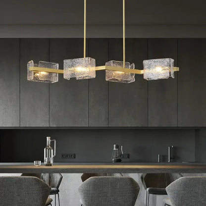 Modern gold crystal ceiling chandelier with textured translucent glass cubes suspended by slender rods decorbites crystal ceiling