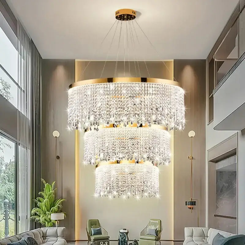 Modern gold crystal chandelier lighting fixture with cascading clear crystals and gold-finished frame for dining room decorbites crystal chandelier