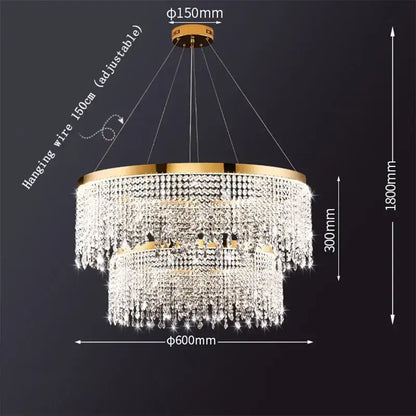 Modern gold crystal chandelier lighting fixture with two-tiered metal frame and cascading clear crystals by decorbites