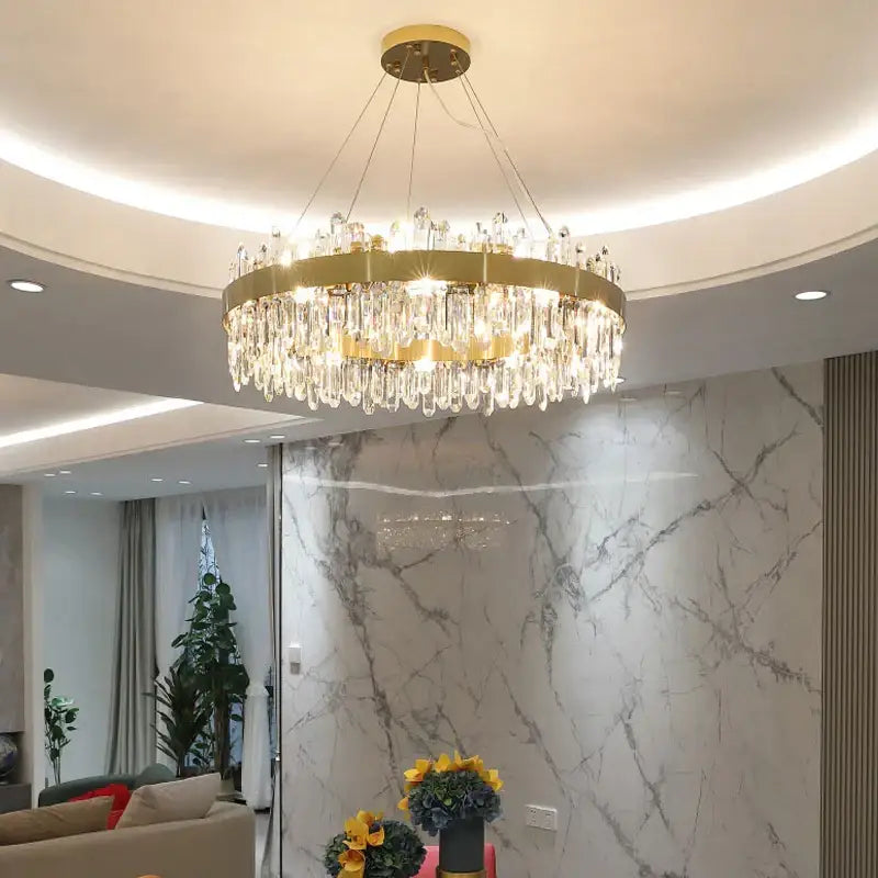 Modern gold crystal circle ceiling chandelier featuring cascading clear crystal droplets for elegant dining room decorbites crystal circle
