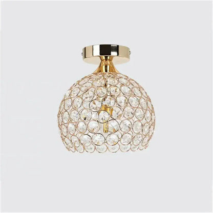 A modern gold crystal diamond ceiling light with clear faceted crystals for dining room ceiling light decor