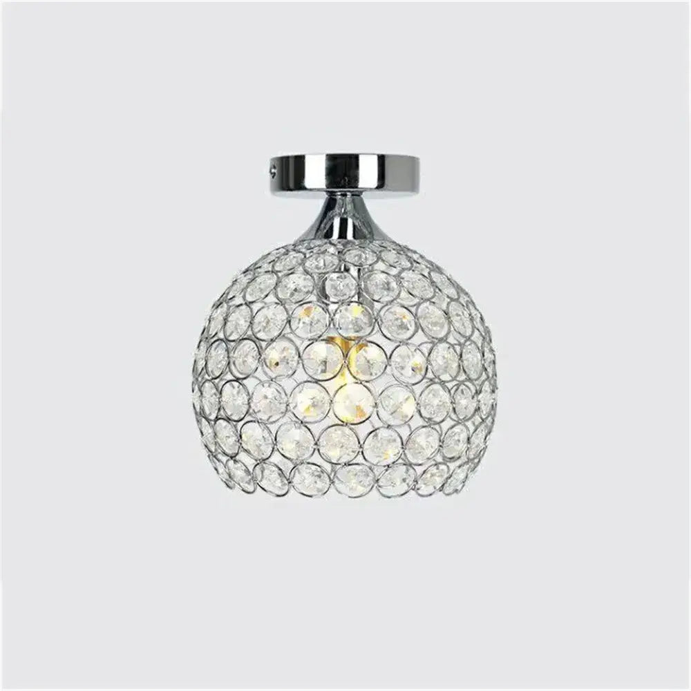 Modern gold crystal diamond ceiling light featuring spherical faceted crystals with chrome ceiling light mount for dining room