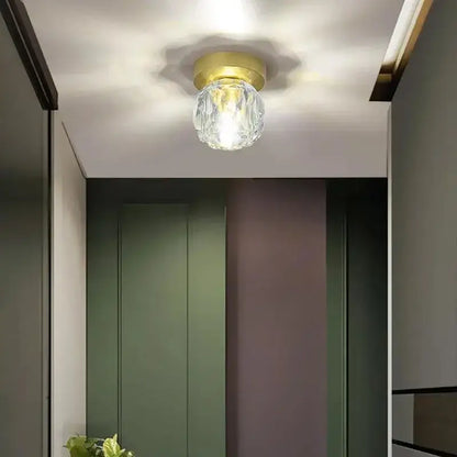 Modern gold decorbites crystal entrance ceiling lamp with a crystal globe and metal base for balcony and hallway decor