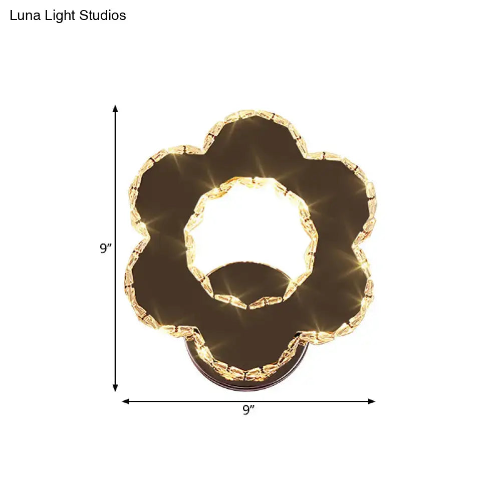 Modern gold crystal flower wall sconce with gold-toned accents, dark brown panel, warm white 220v-240v light fixture
