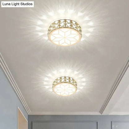 Gold-toned DecorBites flush mount ceiling light with crystal-encrusted starburst diffuser for elegant passageway lighting