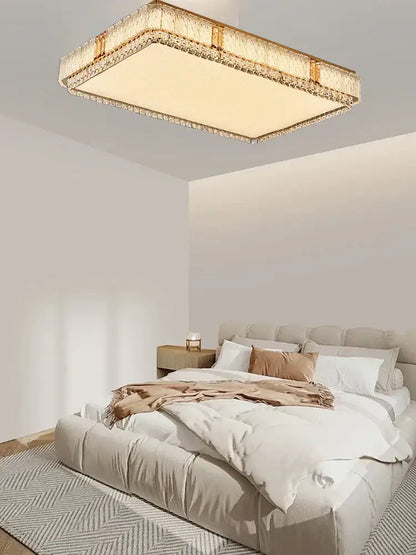 Modern gold crystal glass ceiling light fixture with warm glow and sparkling crystal glass ceiling accents for living room decor