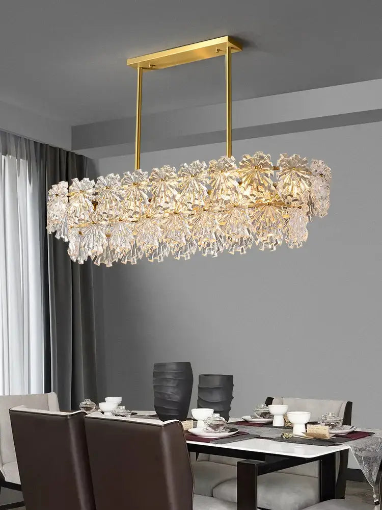 Modern gold crystal glass led pendant chandelier with rectangular metal frame and radial faceted crystals for dining room
