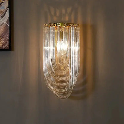 A modern gold crystal glass pendant light wall sconce with cascading clear glass tubes by decorbites crystal glass