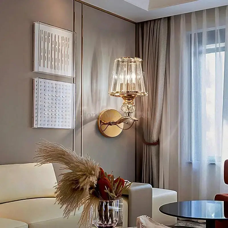 Modern gold crystal glass wall lamp with faceted crystal shade and decorative accents for luxury bedroom decorbites wall lamp