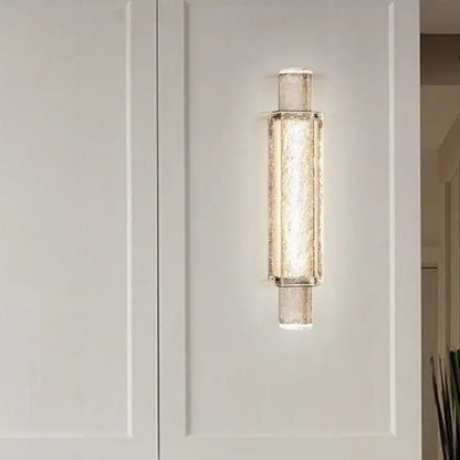 Modern gold crystal glass wall lamps with textured translucent glass and metallic accents for bedroom wall lights