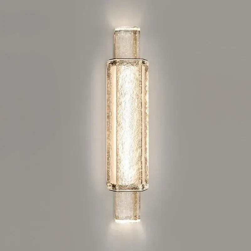 Modern gold crystal glass wall lamps featuring textured translucent glass and metallic frame for elegant wall lights