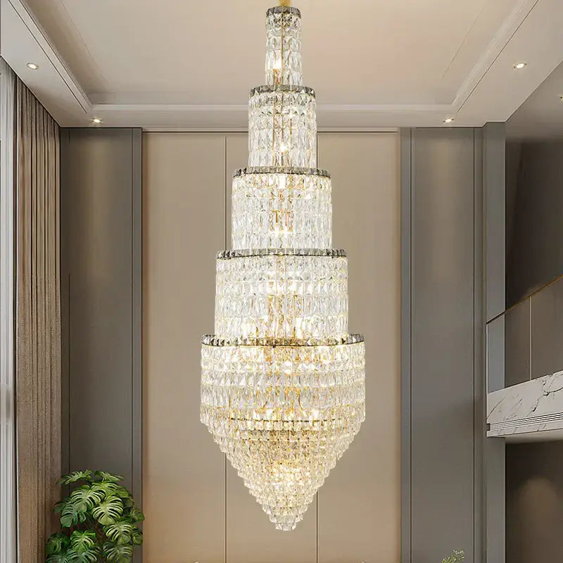 Modern gold crystal hollow long chandelier with tiered conical design and gold-toned metal accents for villa hall lighting